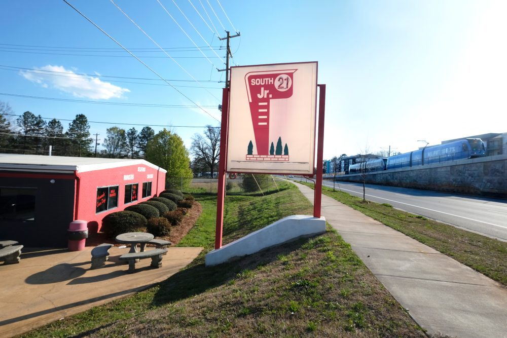 South 21 Junior Diner, near the University City Boulevard Station, is related to the South 21 restaurants started by three Greek immigrant brothers in 1955. The flagship South 21 on South Boulevard closed around 2007 and was demolished for redevelopment adjacent to the Lynx Blue Line Scaleybark Station. The South 21 Drive-In on Independence Boulevard survives. Photo: Nancy Pierce