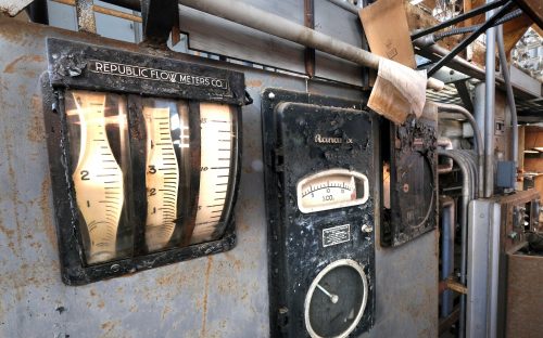 Gauges in an old flow meter have warped with the passage of time.