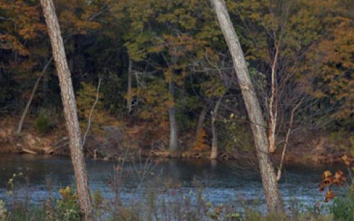 A couple strolls beside the Catawba River on the Piedmont Medical Center Trail in November 2011.