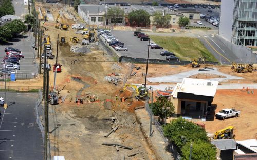 he view from Seventh Street Station parking deck, looking north to Ninth Street. UNC Charlotte Center City is at upper right, with construction on First Ward Park next to it. Photo: Nancy Pierce