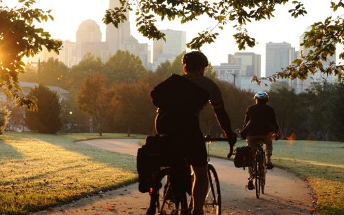 Two bicyclists take the Stewart Creek Greenway into downtown Charlotte in October 2011.