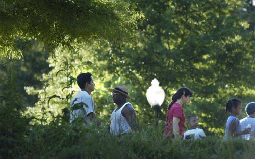 A group walks along Little Sugar Creek Greenway Trail in Mecklenburg County in May 2005.