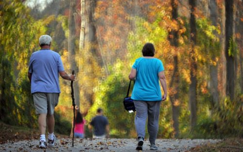 A couple walks along the Piedmont Medical Center Trail in November 2011.