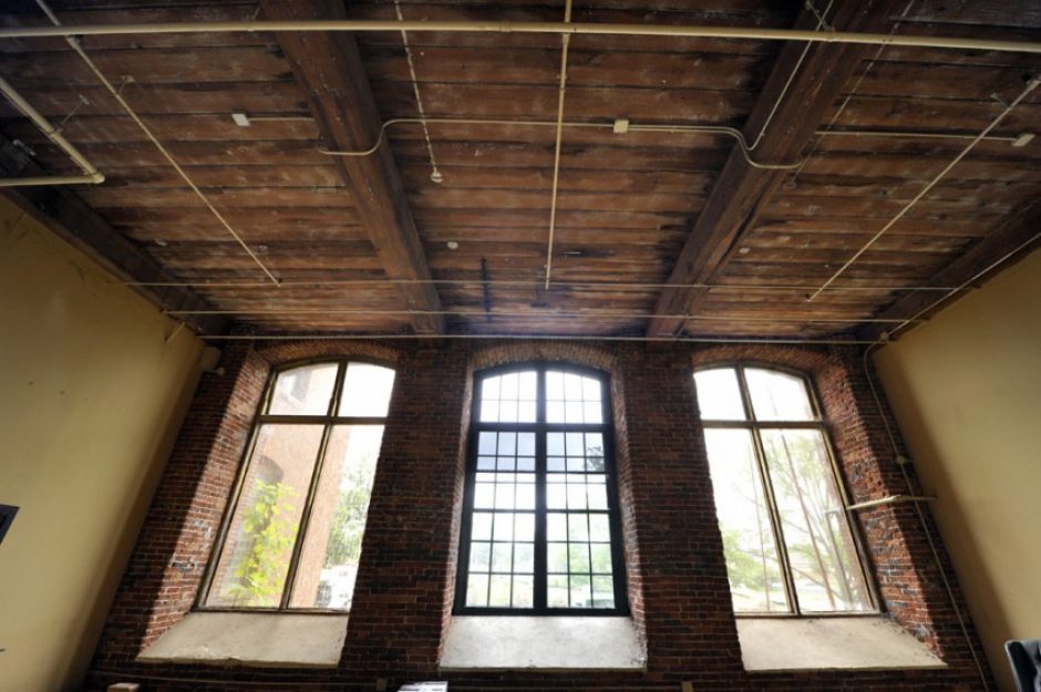 This area inside the Loray shows how apartments will look. This is a typical apartment window configuration with high ceilings. Photo: Nancy Pierce